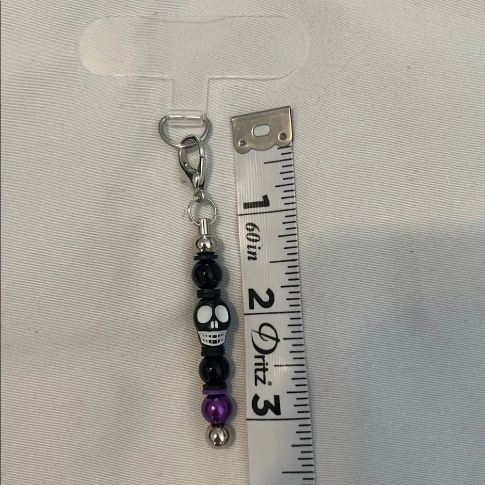NWT one of a kind Angelas Designs black and purple skull cell phone charm